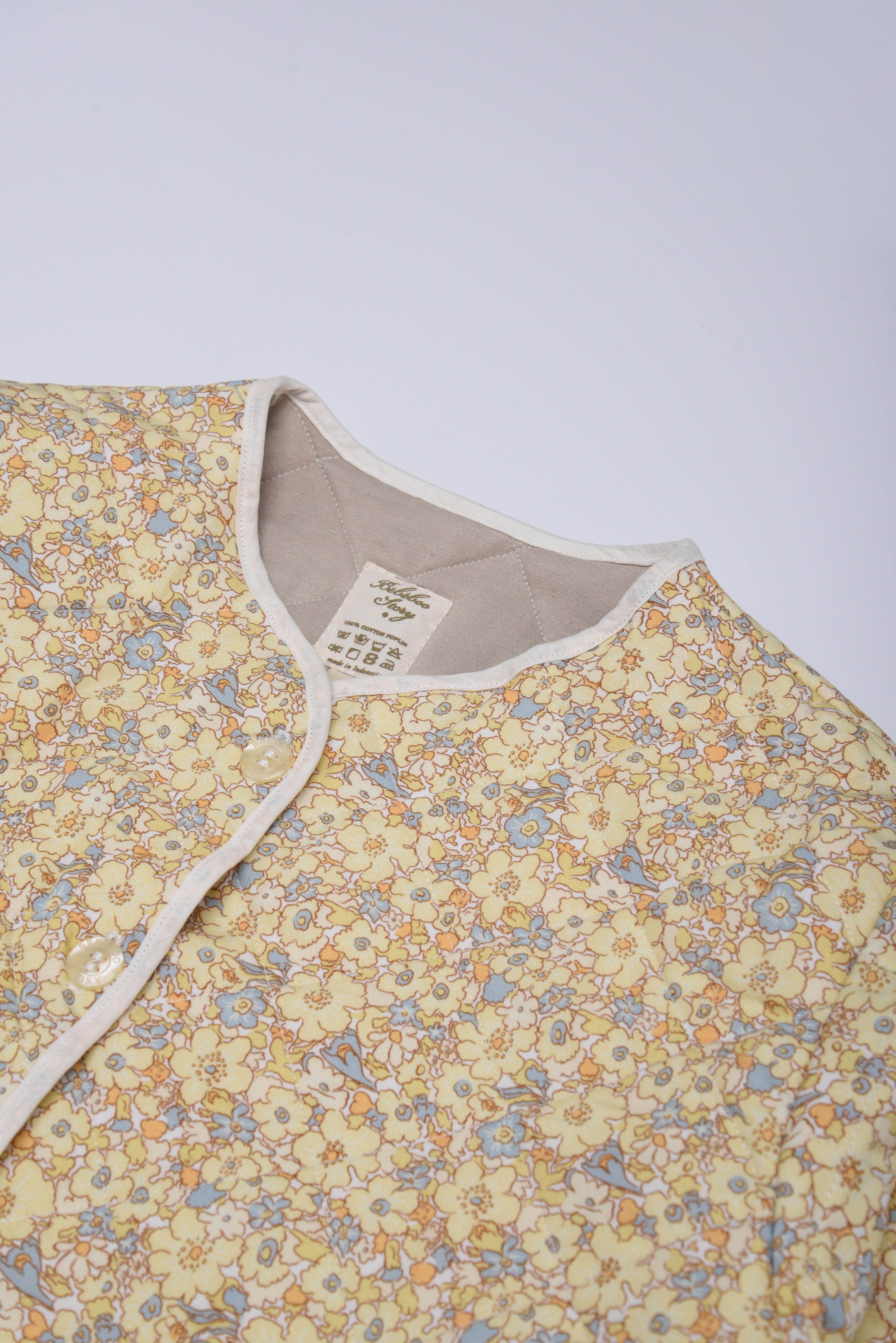 Woman’s Quilted Jacket in Marigold