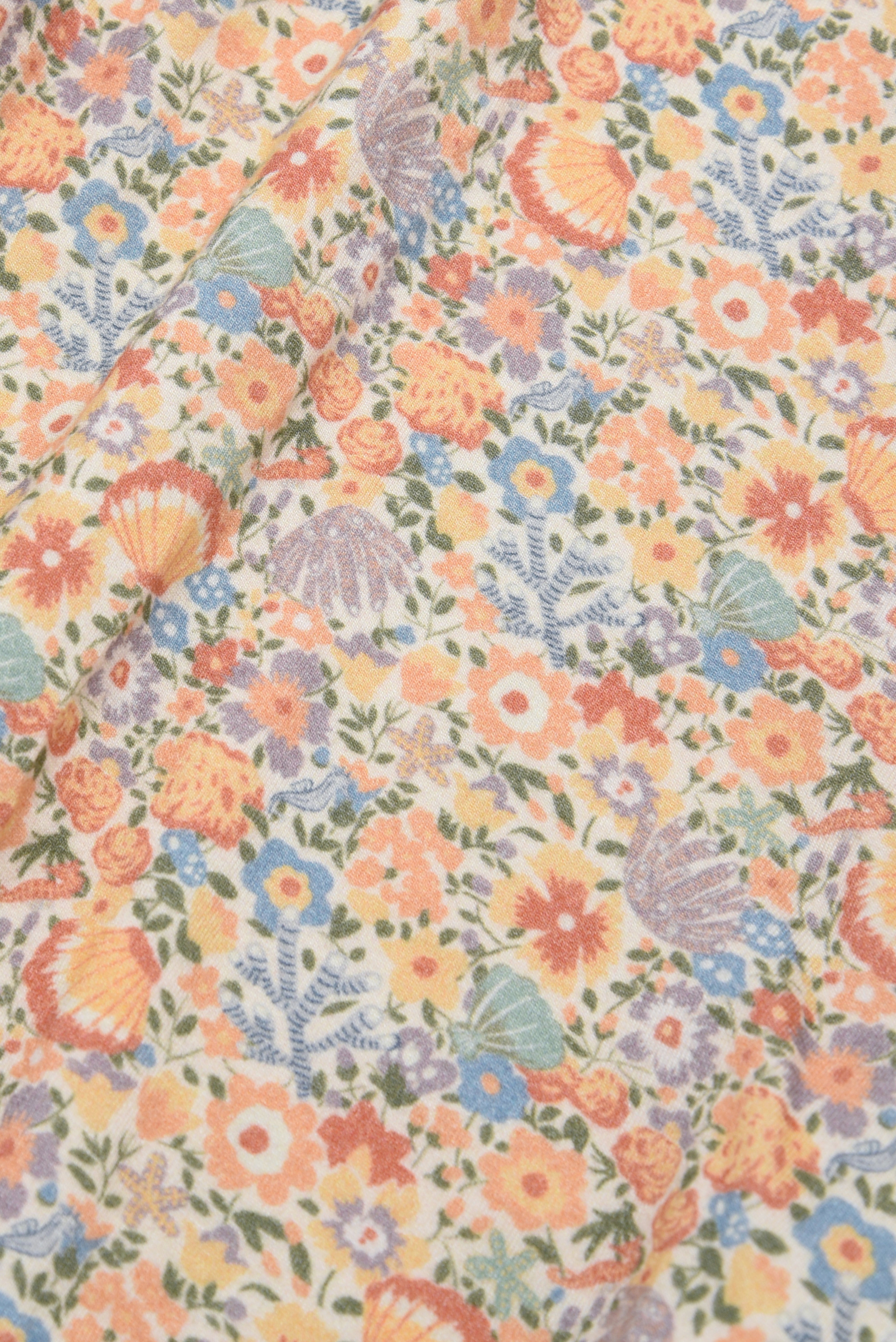 Petite Cuddle Pillow in Coralino